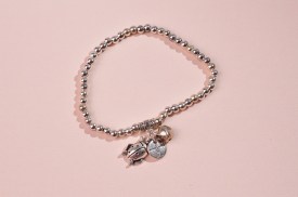 Pulsera metalica 3 dijes VAQUITA DE SAN ANTONIO (1).jpg